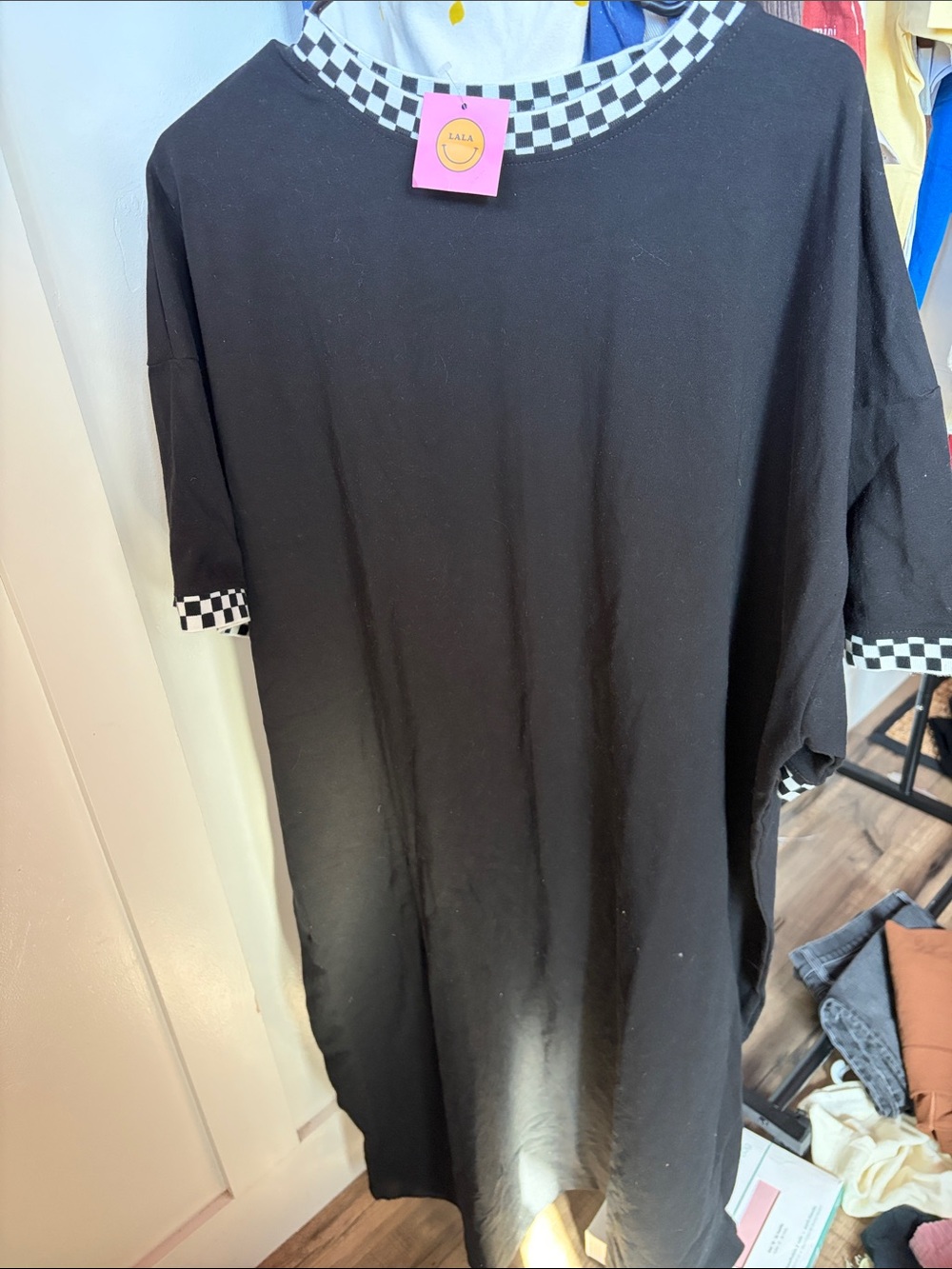 Dressed in lala stretchy black dress with checkered collar and sleeves